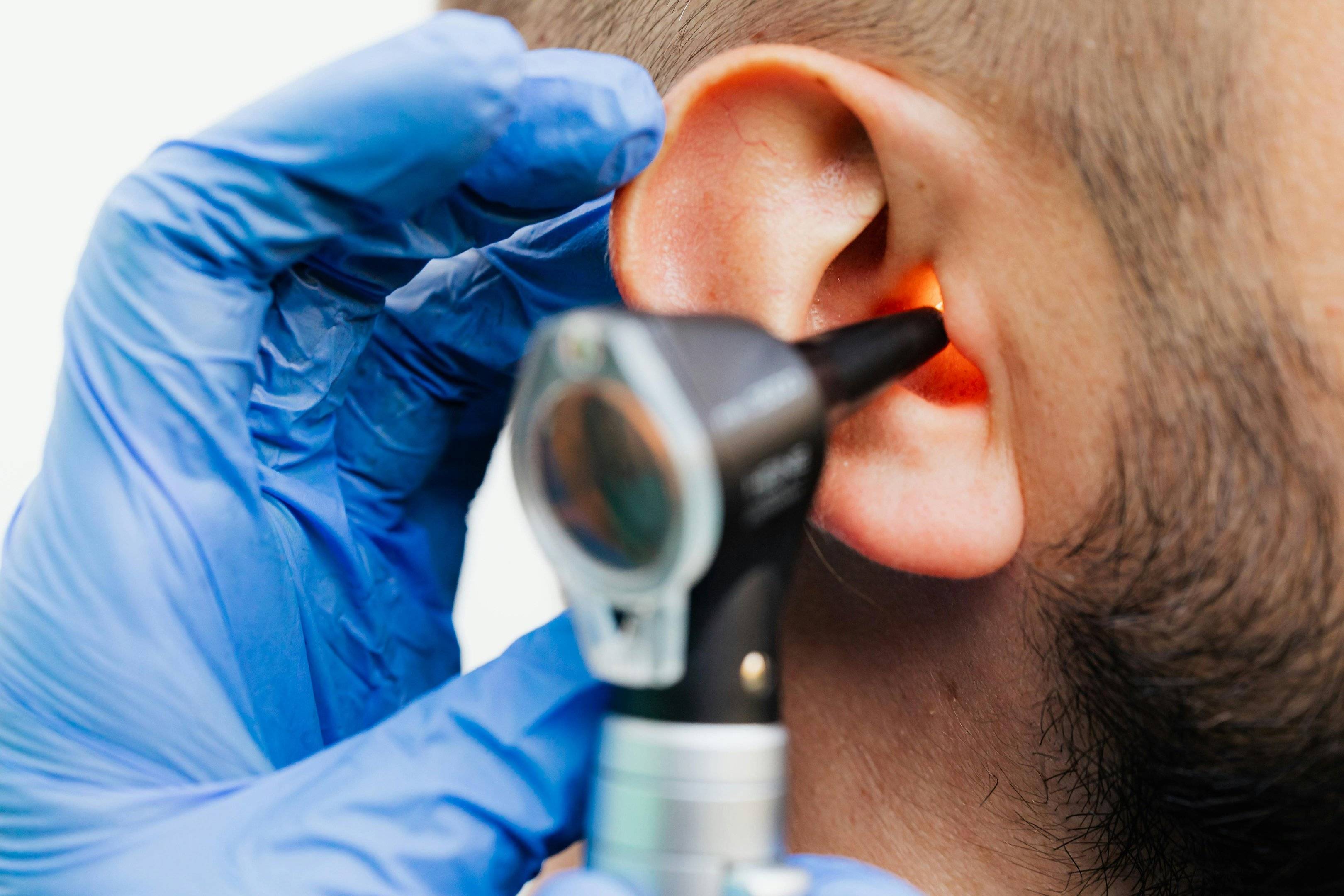 Audiologist providing comfortable concierge hearing care in a senior's home